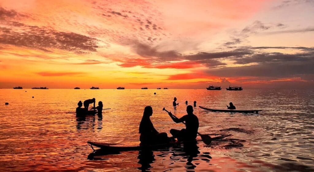 Enjoy the breathtaking sunset while paddle boarding